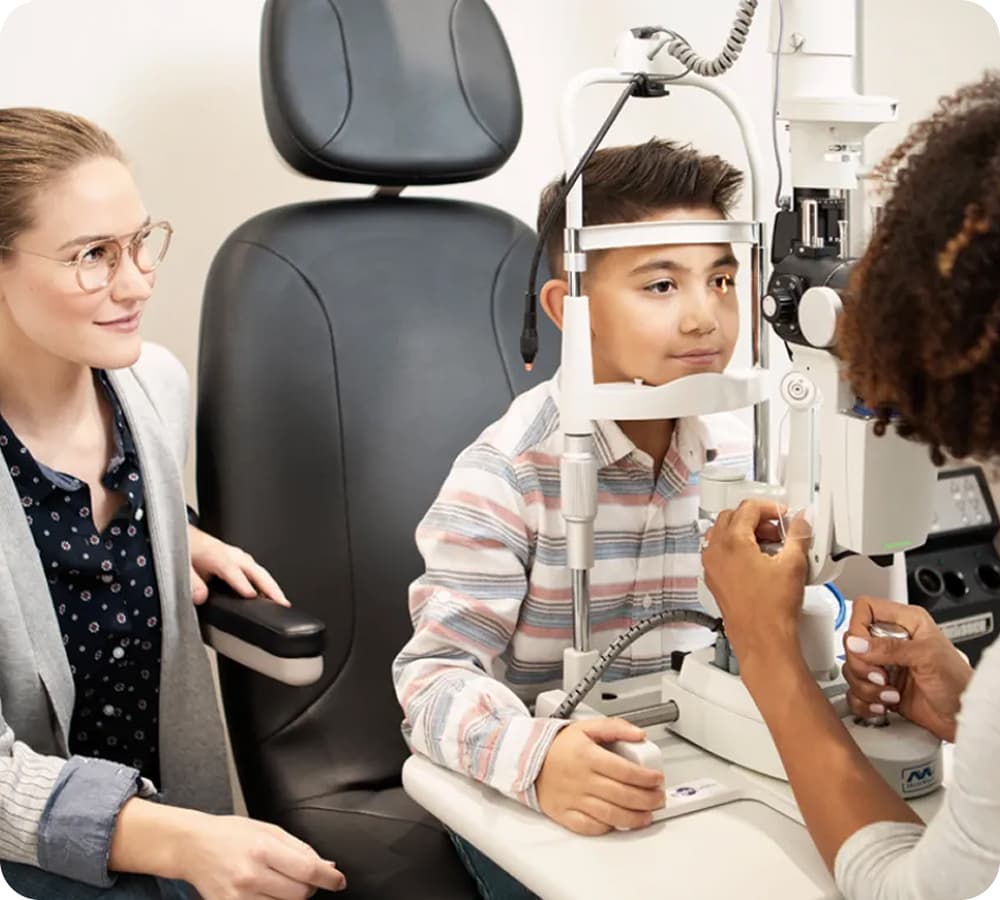 Eye care professional examining a patient in a modern clinic